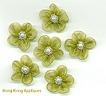 Each piece measures approx.1" from tip to tip of leaf and the flower itself is approx. 1/2" in diameter.